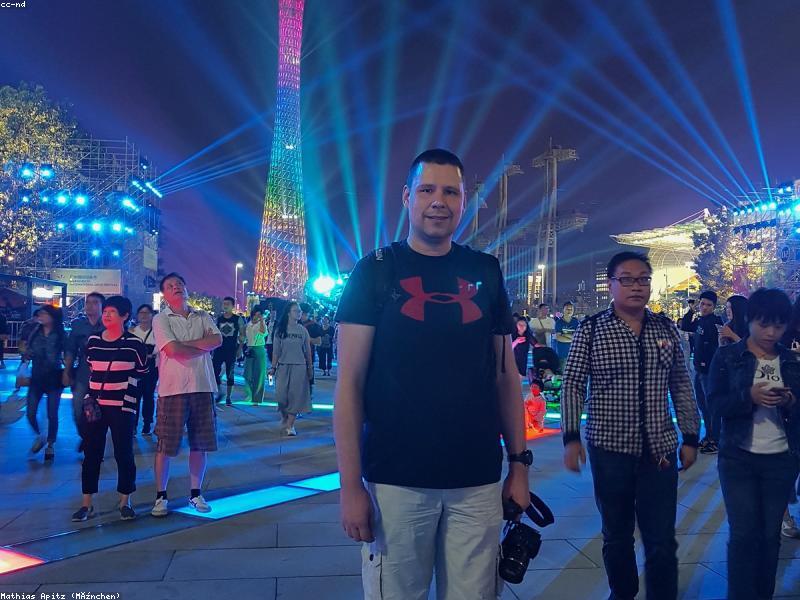 Busy Chinese street with neon signs and crowds