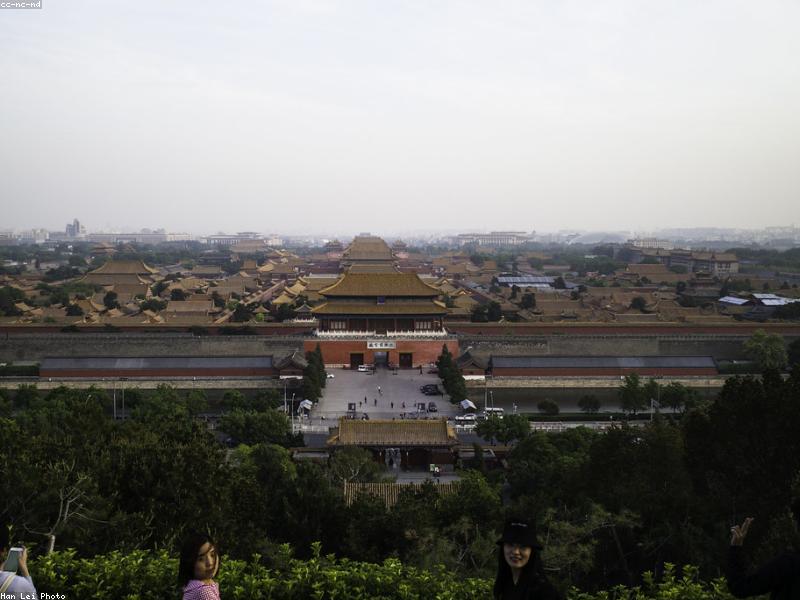 The Forbidden City in Beijing with golden rooftops and blue sky
